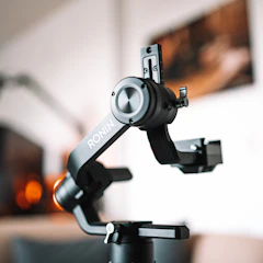 Close-up of a sleek Ravin crossbow cam mechanism in motion.