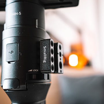 Blueprint-style close-up of the CalibraLock universal camera mount on an 18-wheeler.