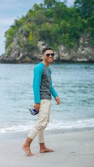 Happy customer walking outdoors wearing vibrant winkers Sponch sandals.