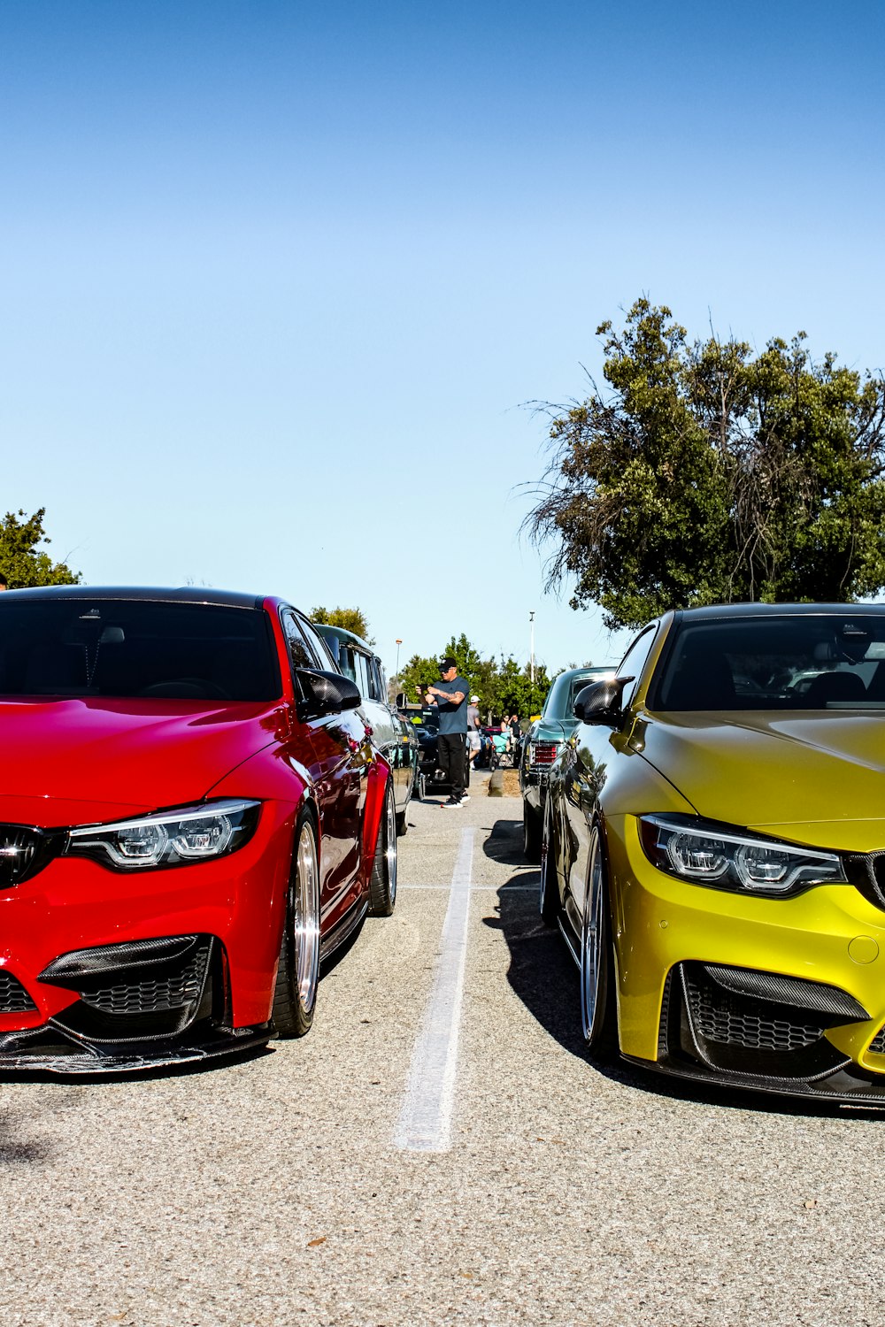 a group of cars parked on the side of a road