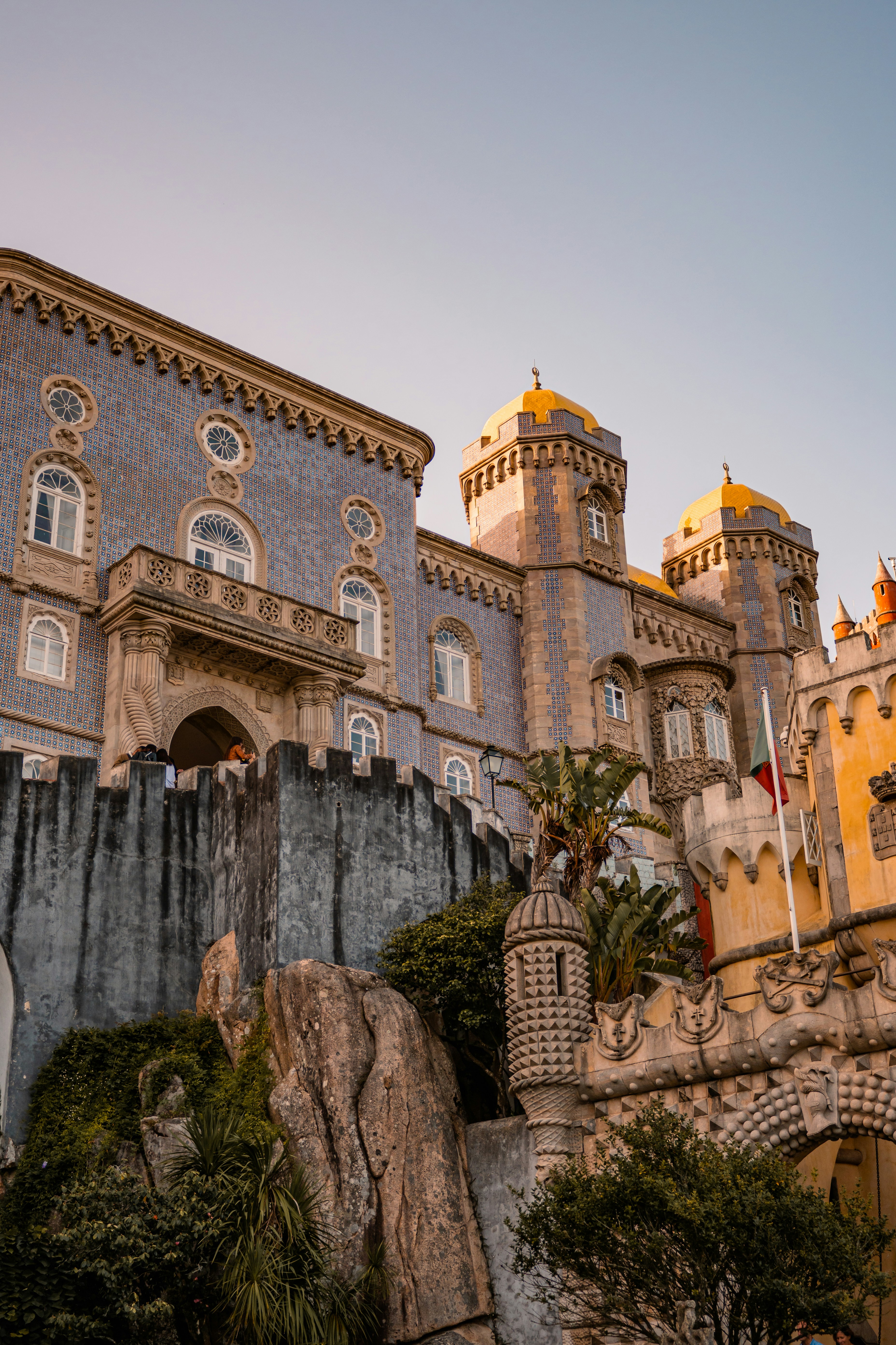 A large castle like building with a clock tower photo – Free Sintra ...