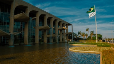 a large building with a flag on top of it