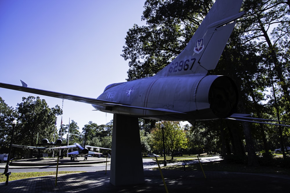 a plane that is on display in a park