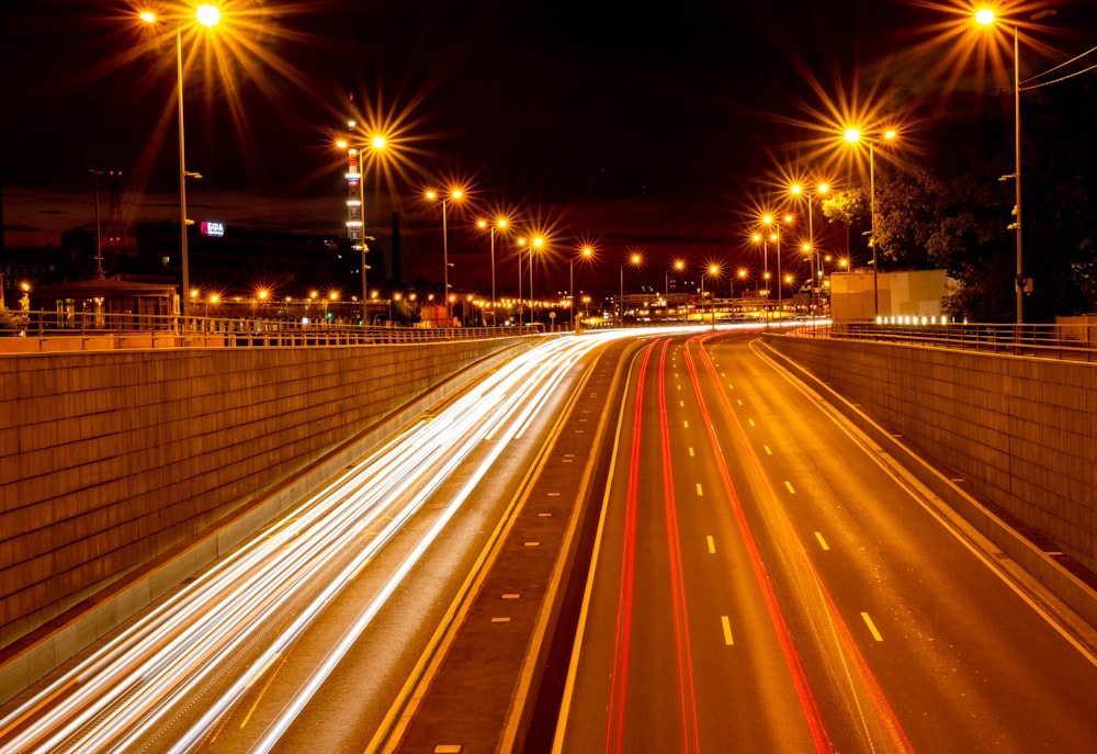 a city street at night with street lights