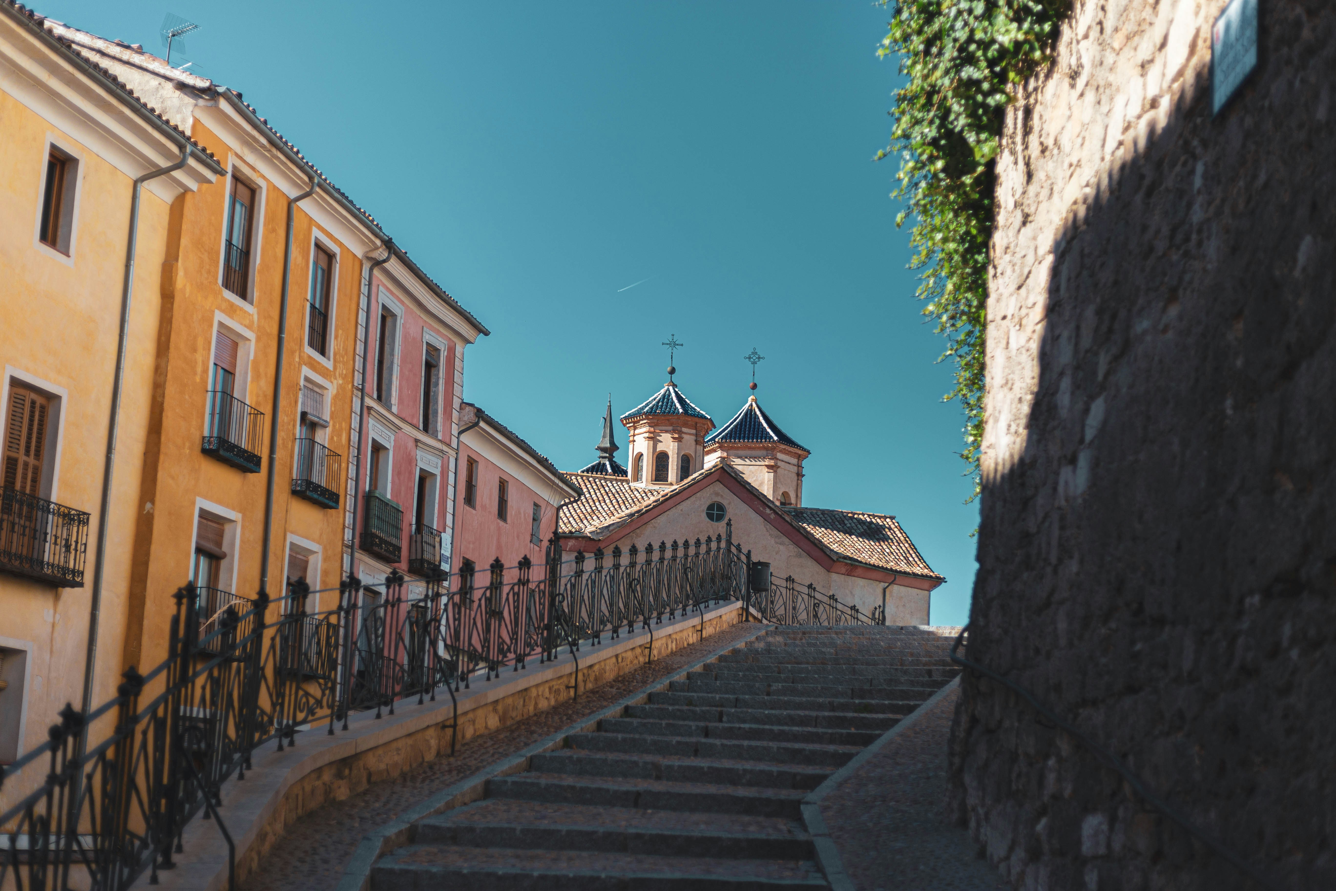 A set of stairs leading up to a building photo – Free City Image on ...