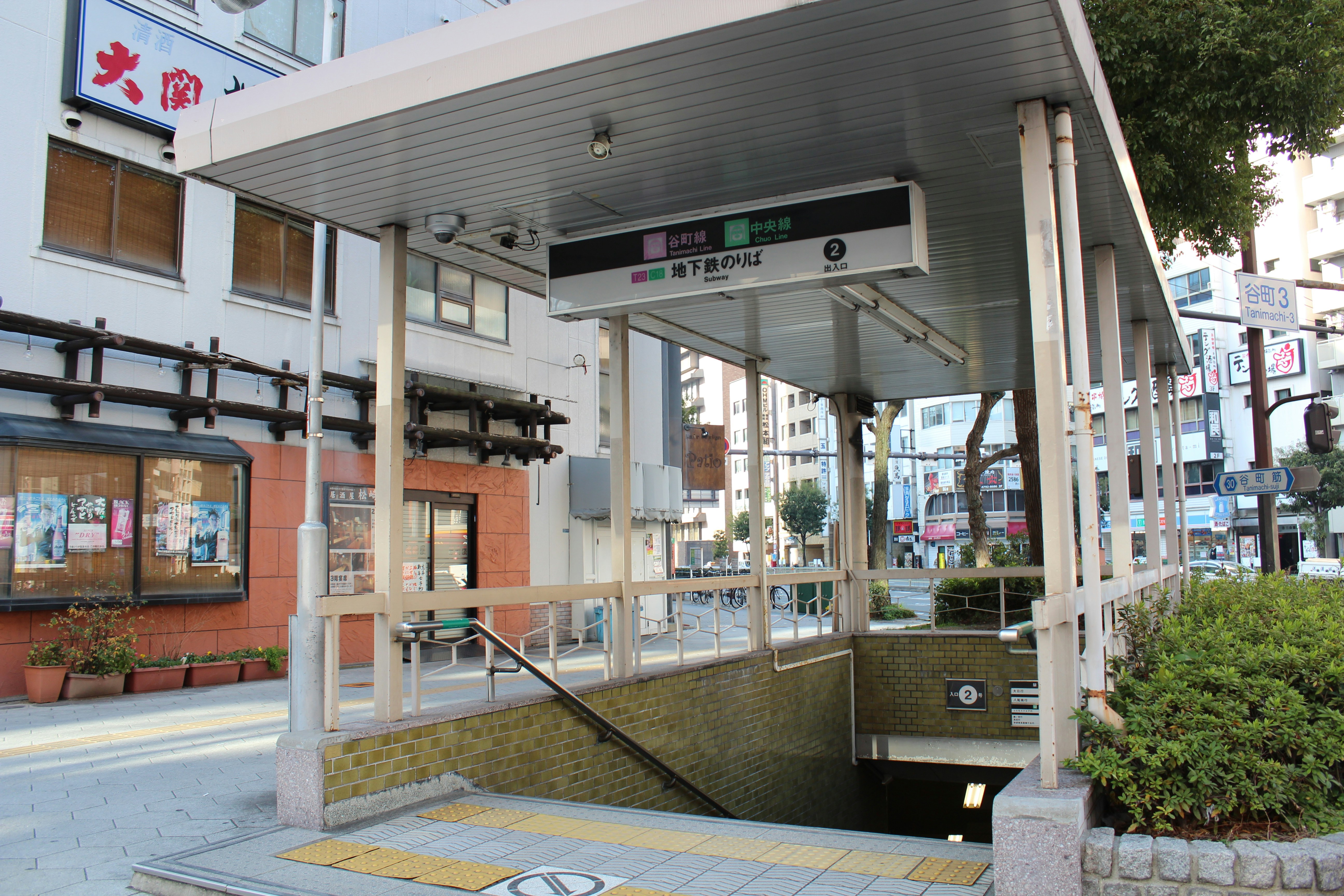 a bus stop on the side of a street