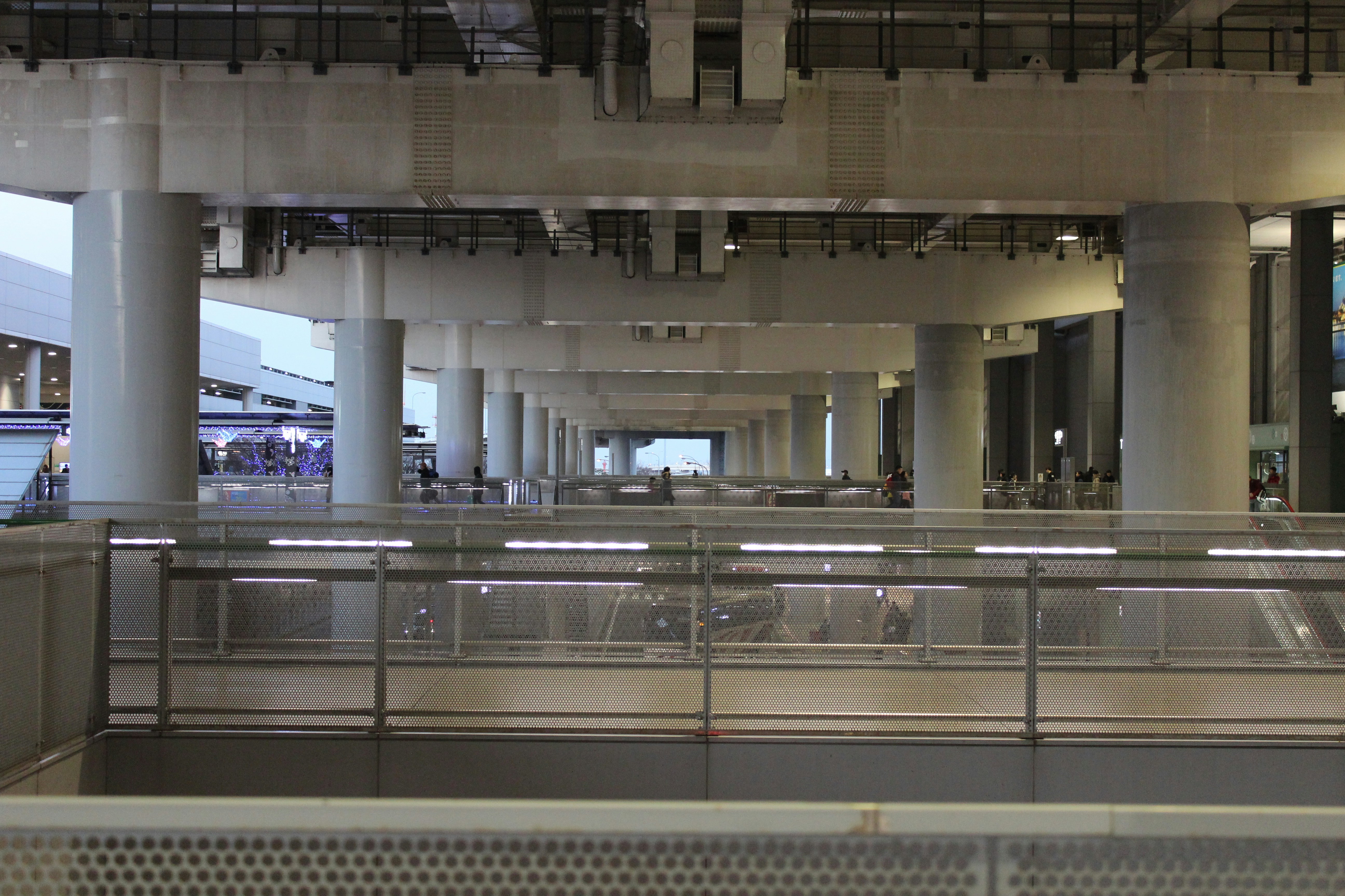 a train station with a train on the tracks, 