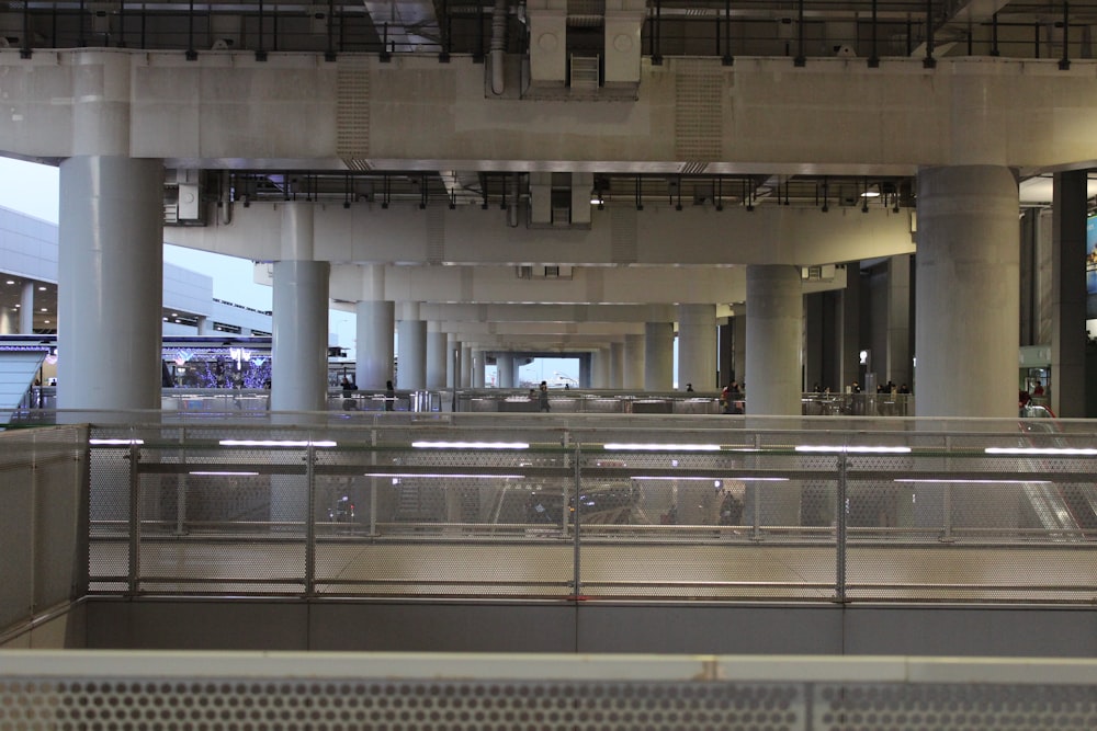 a train station with a train on the tracks