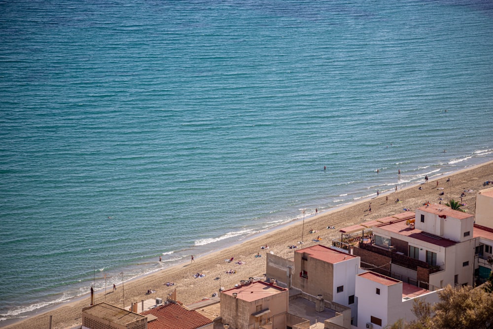 an aerial view of a beach and a city