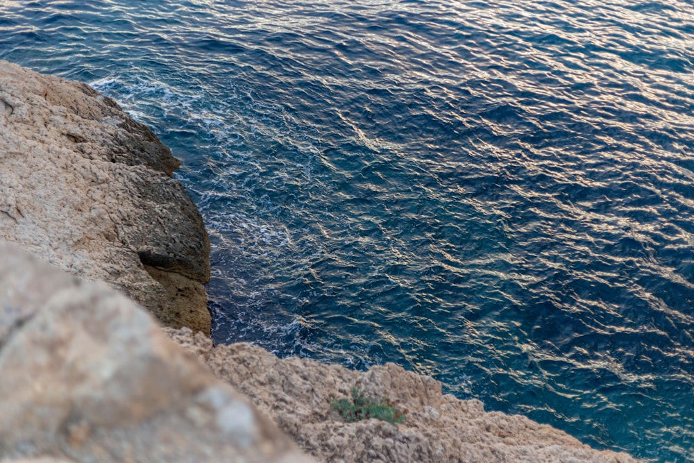 a view of a body of water from a cliff