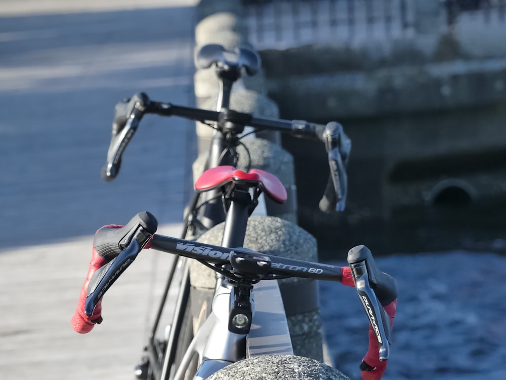 a close up of a bicycle on a bridge