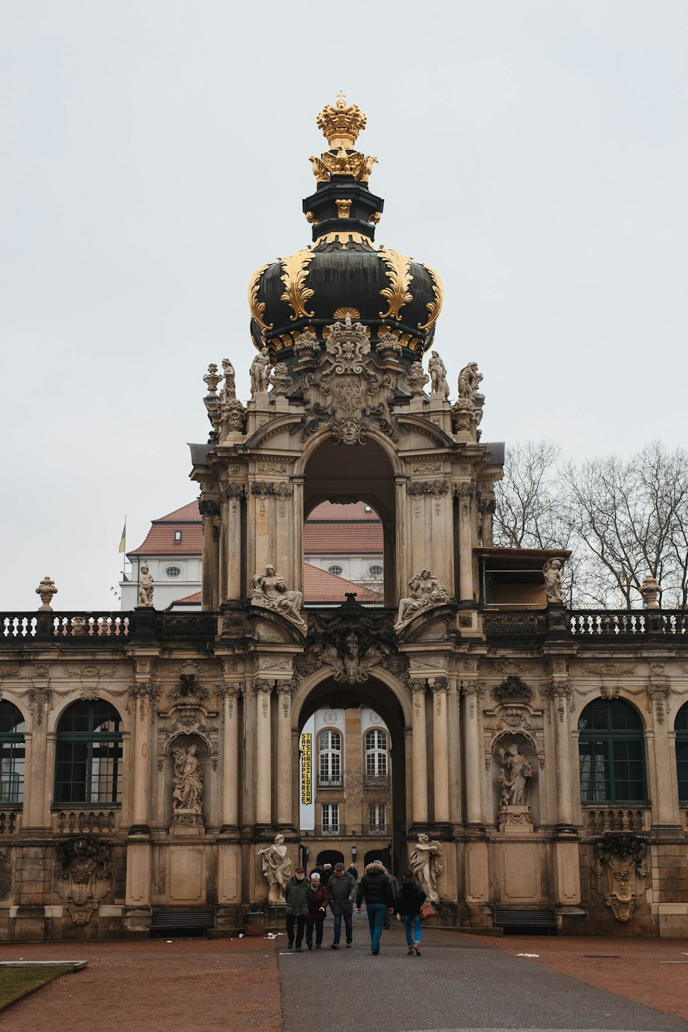 a group of people standing in front of a building