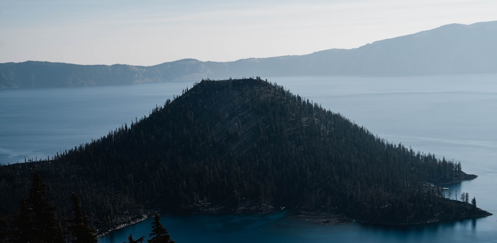 a mountain with a lake in the middle of it