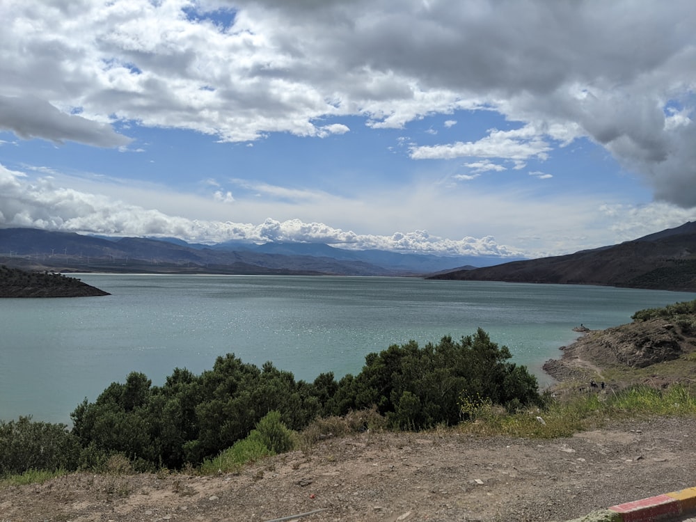 a large body of water surrounded by mountains