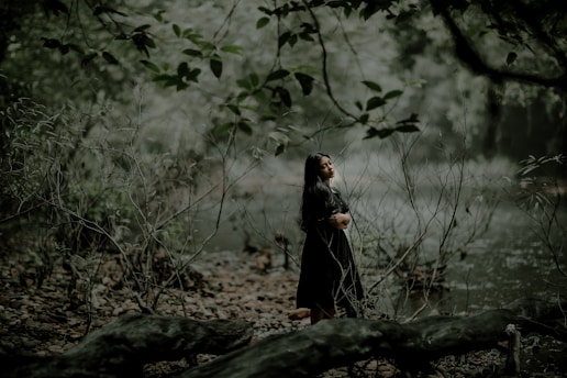 A serene image of a woman enjoying nature, symbolizing wellness during menopause.