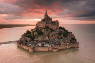 a small island with a church on top of it