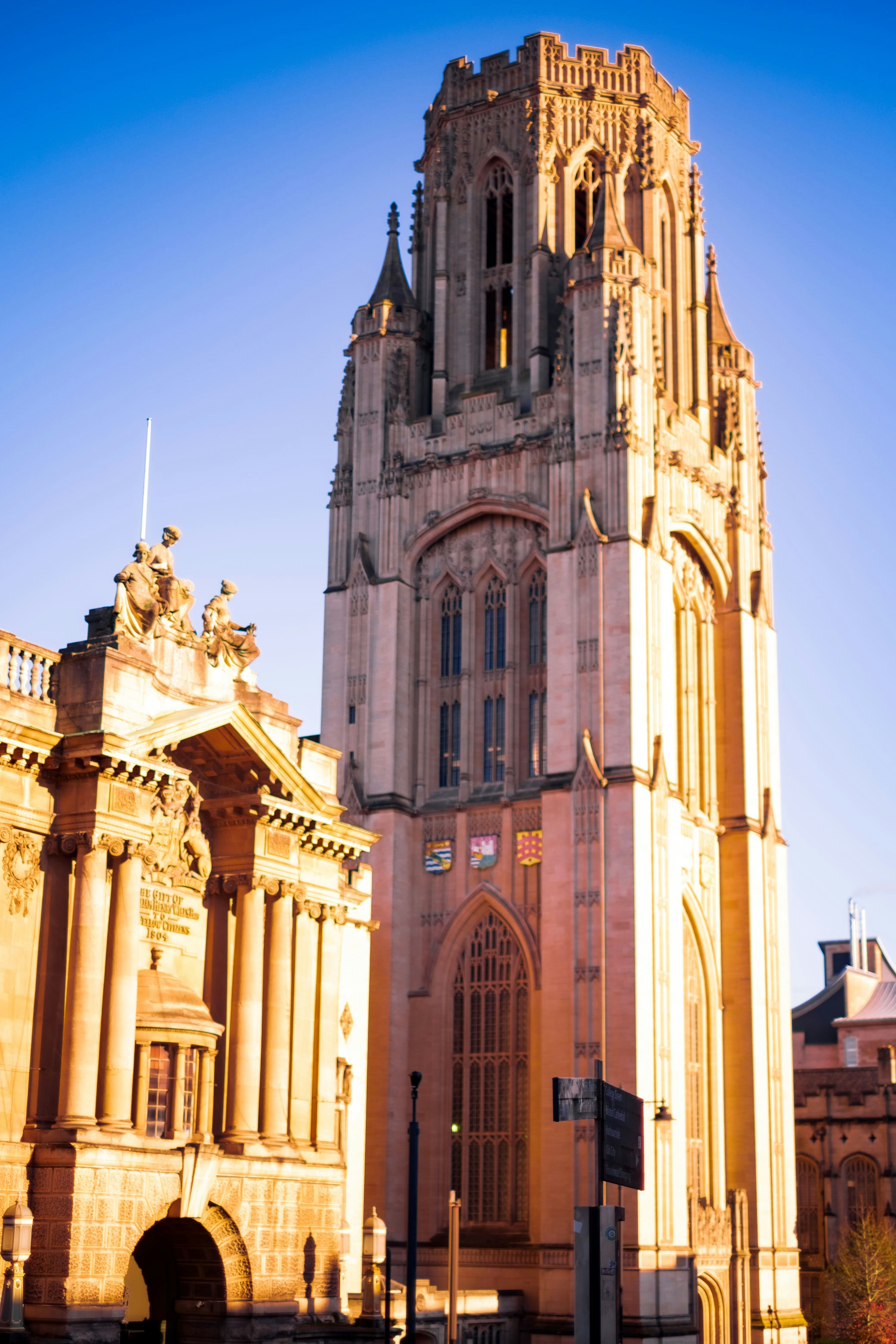 a tall building with a clock on the front of it