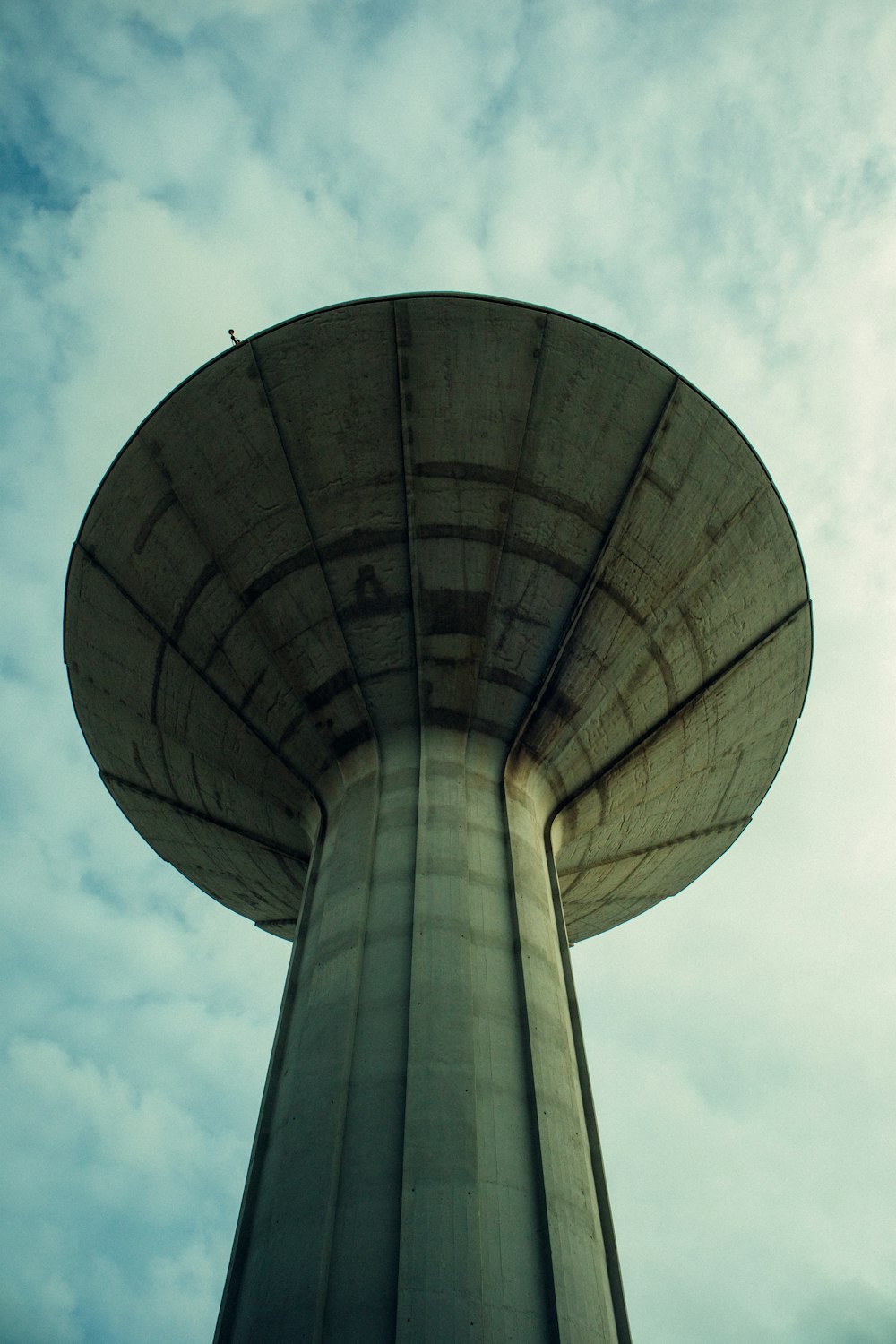 a very tall tower with a sky in the background