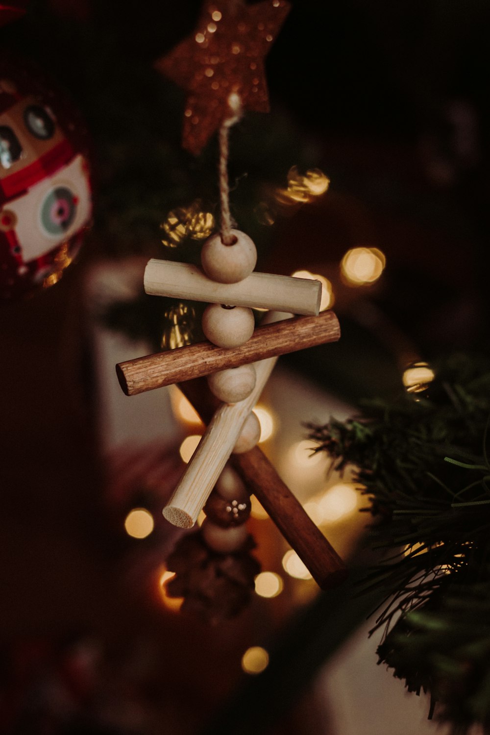 a christmas ornament hanging from a christmas tree