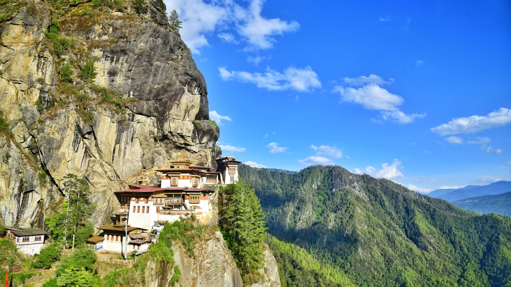 a mountain with a house on the side of it