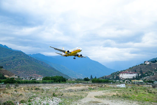 an airplane is flying low to the ground