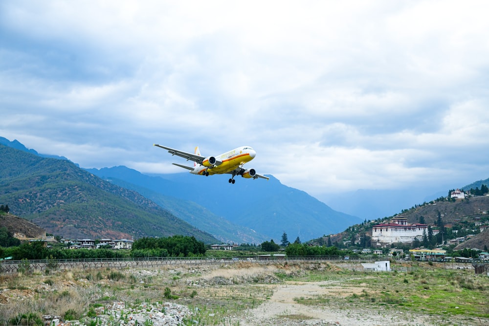 an airplane is flying low to the ground