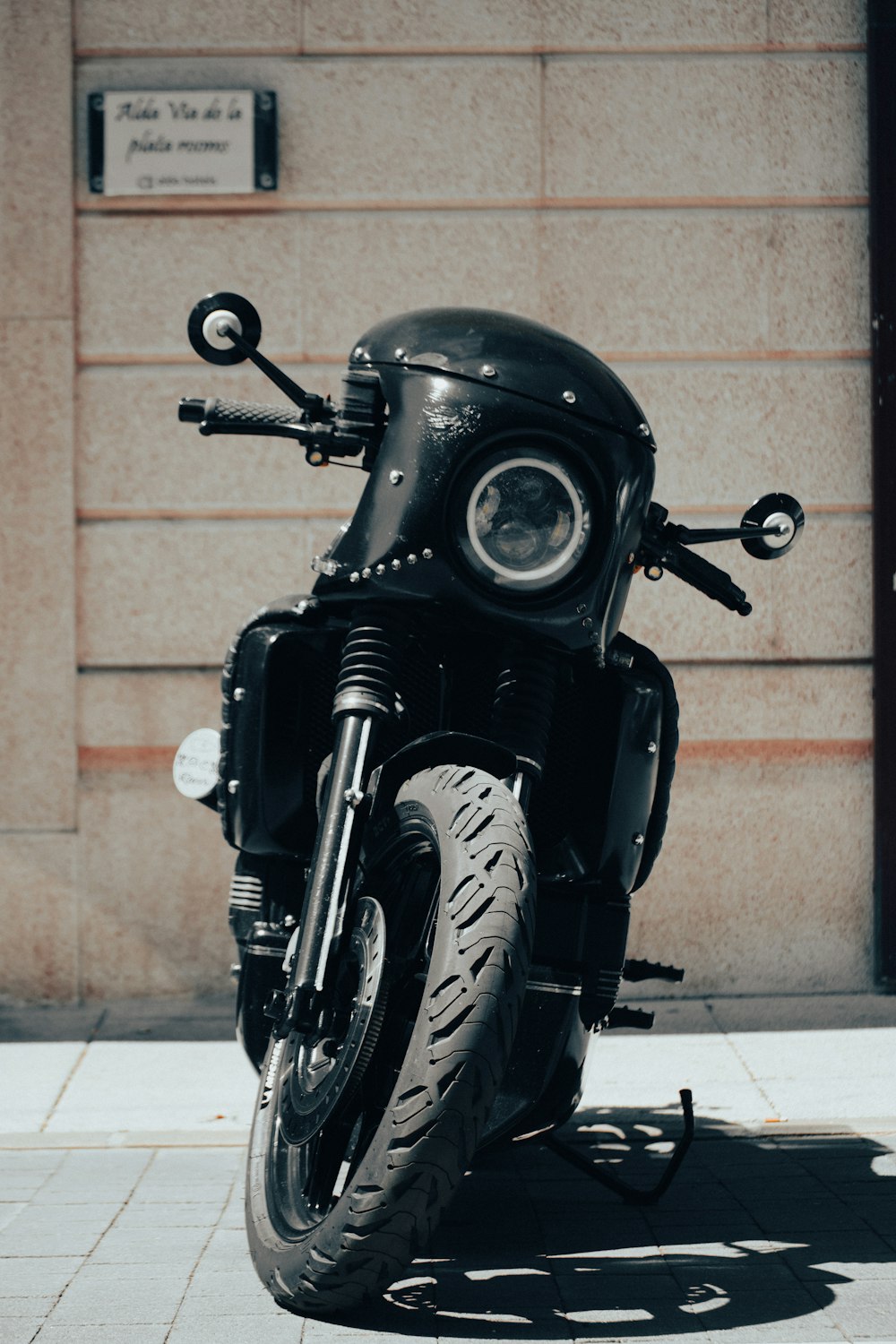 a motorcycle parked on the side of the road