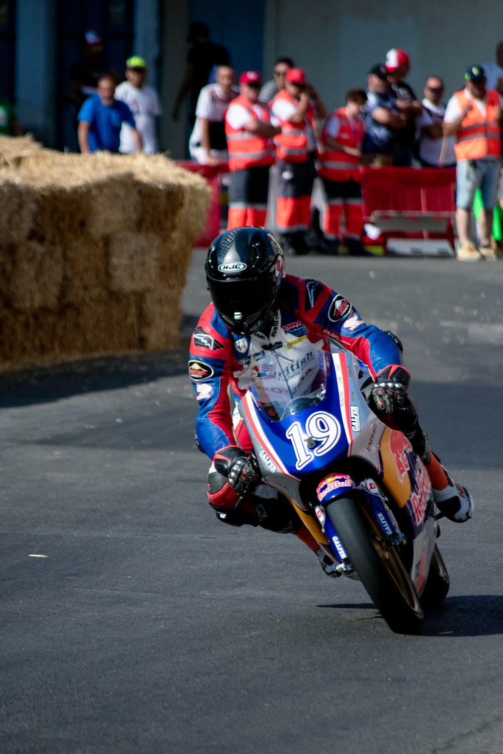 a person riding a motorcycle on a race track