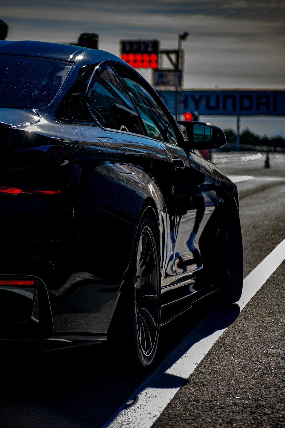 a close up of a car on a city street