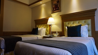 a couple of beds sitting next to each other