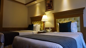 a couple of beds sitting next to each other