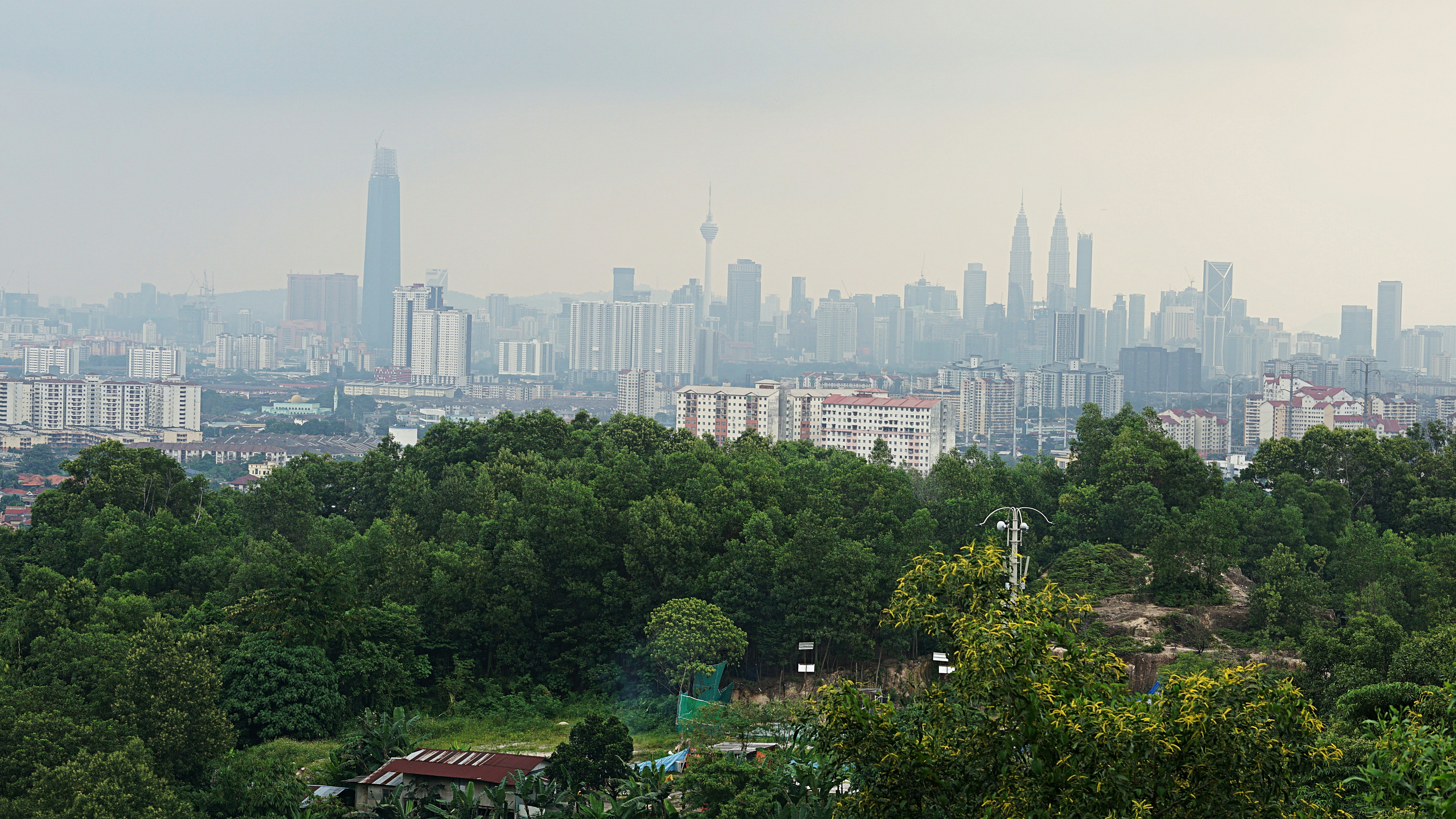 a view of a city from a hill top