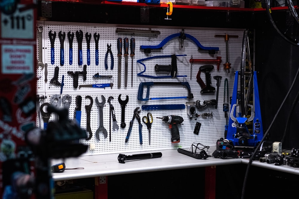 a workbench filled with lots of tools