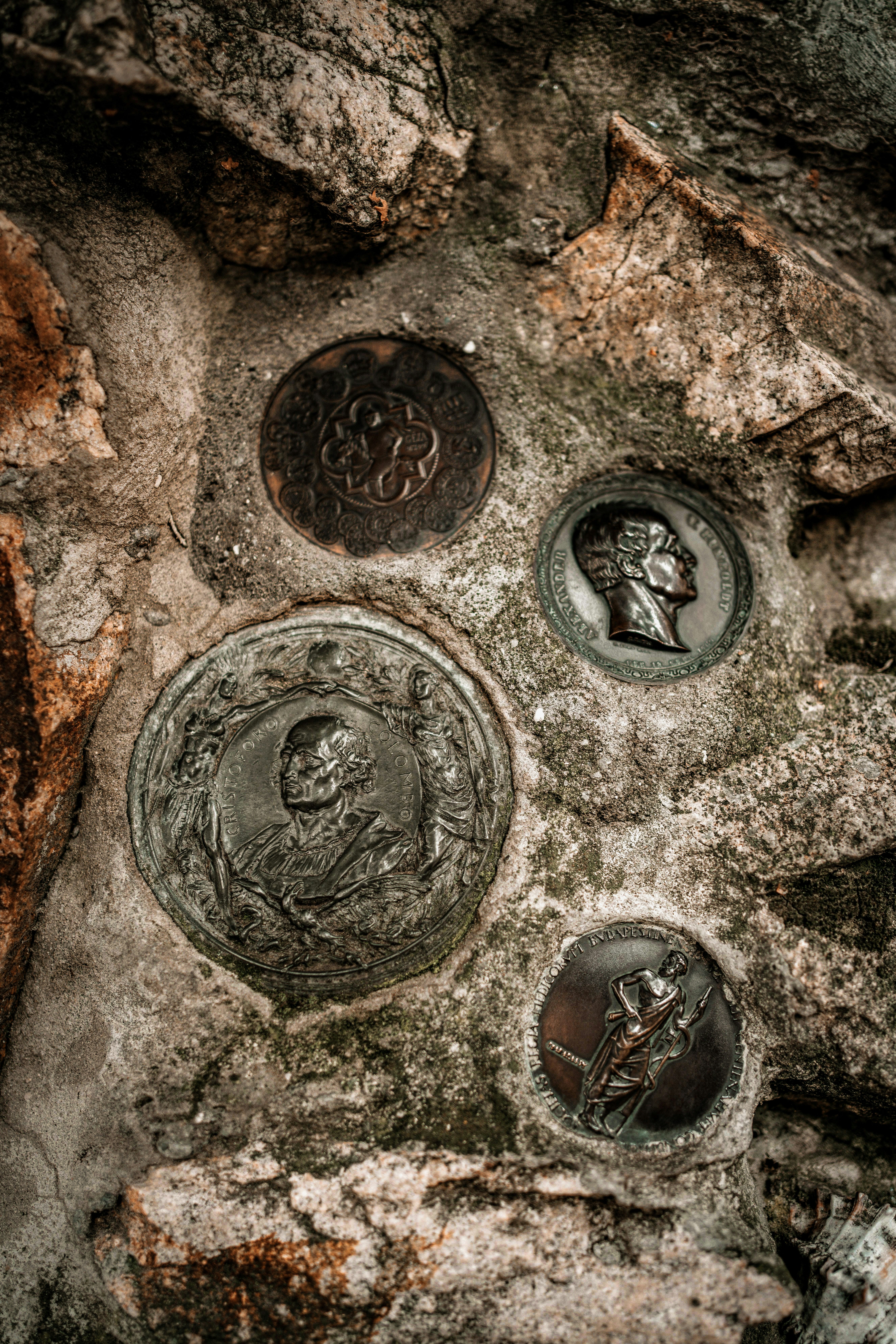 a close up of a rock with a plaque on it