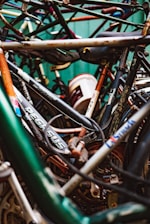 A collection of damaged motorcycles ready for parts extraction.
