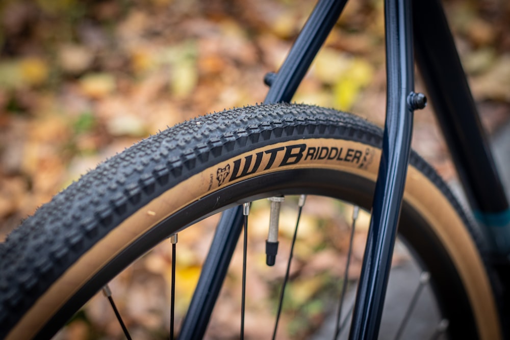 a close up of a bike tire on the ground