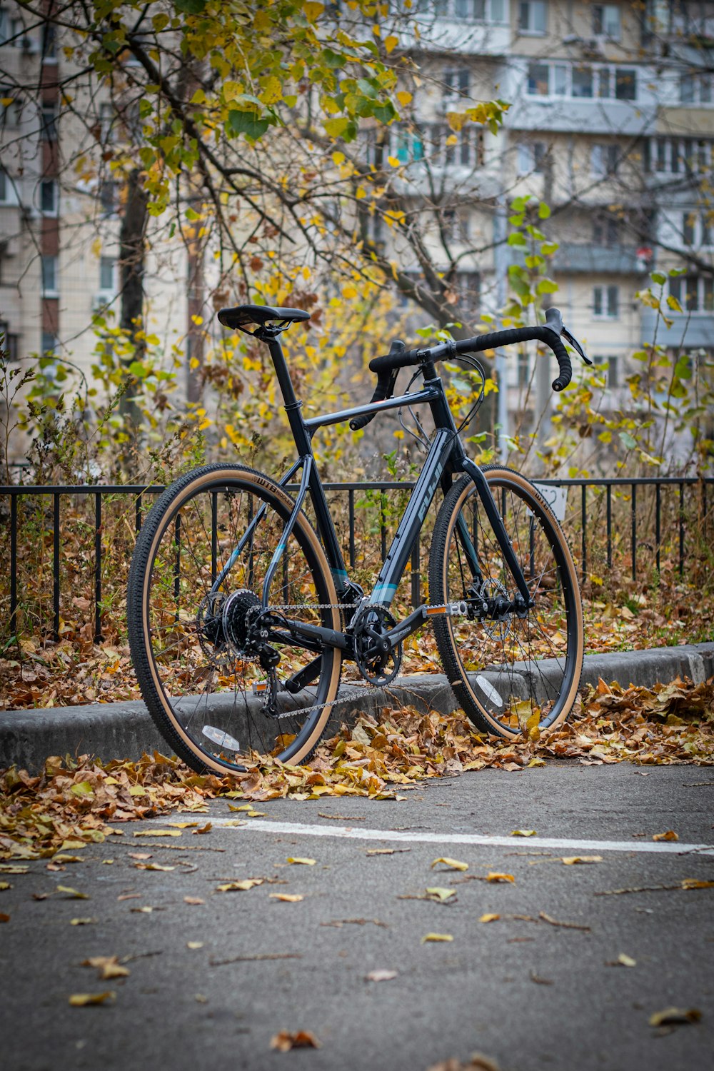 a bicycle parked on the side of the road