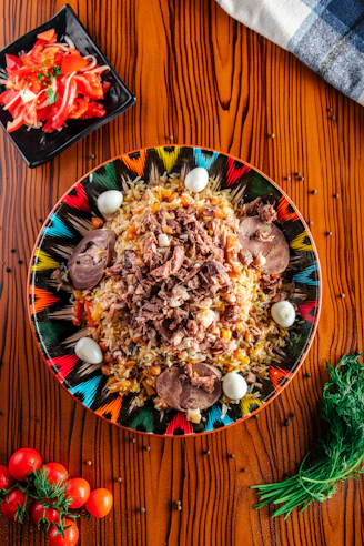 a plate of food on a wooden table