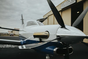 Behind-the-scenes moment of an aviation crew preparing a small aircraft, focused and ready for takeoff.