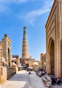 a very tall tower towering over a city