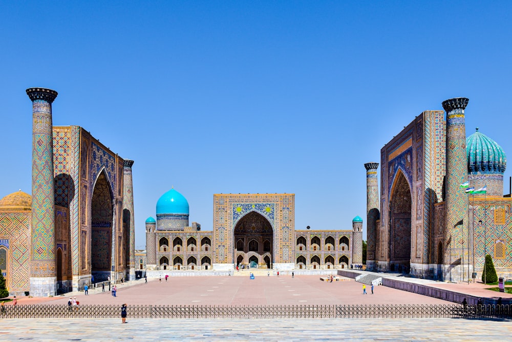 a large building with a blue dome on top of it