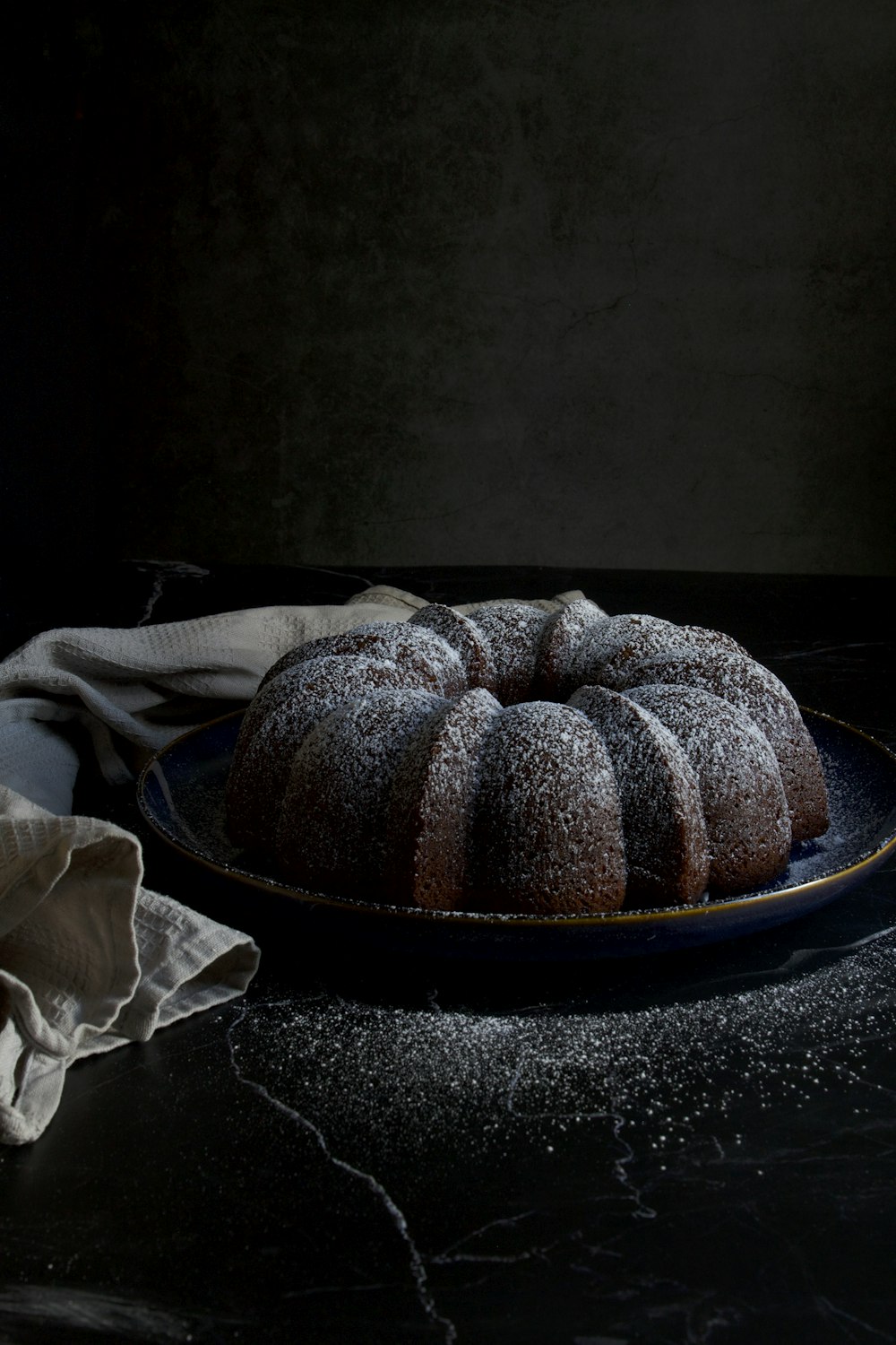 a bundt cake sitting on top of a blue plate