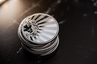 a stack of poker chips sitting on top of a table