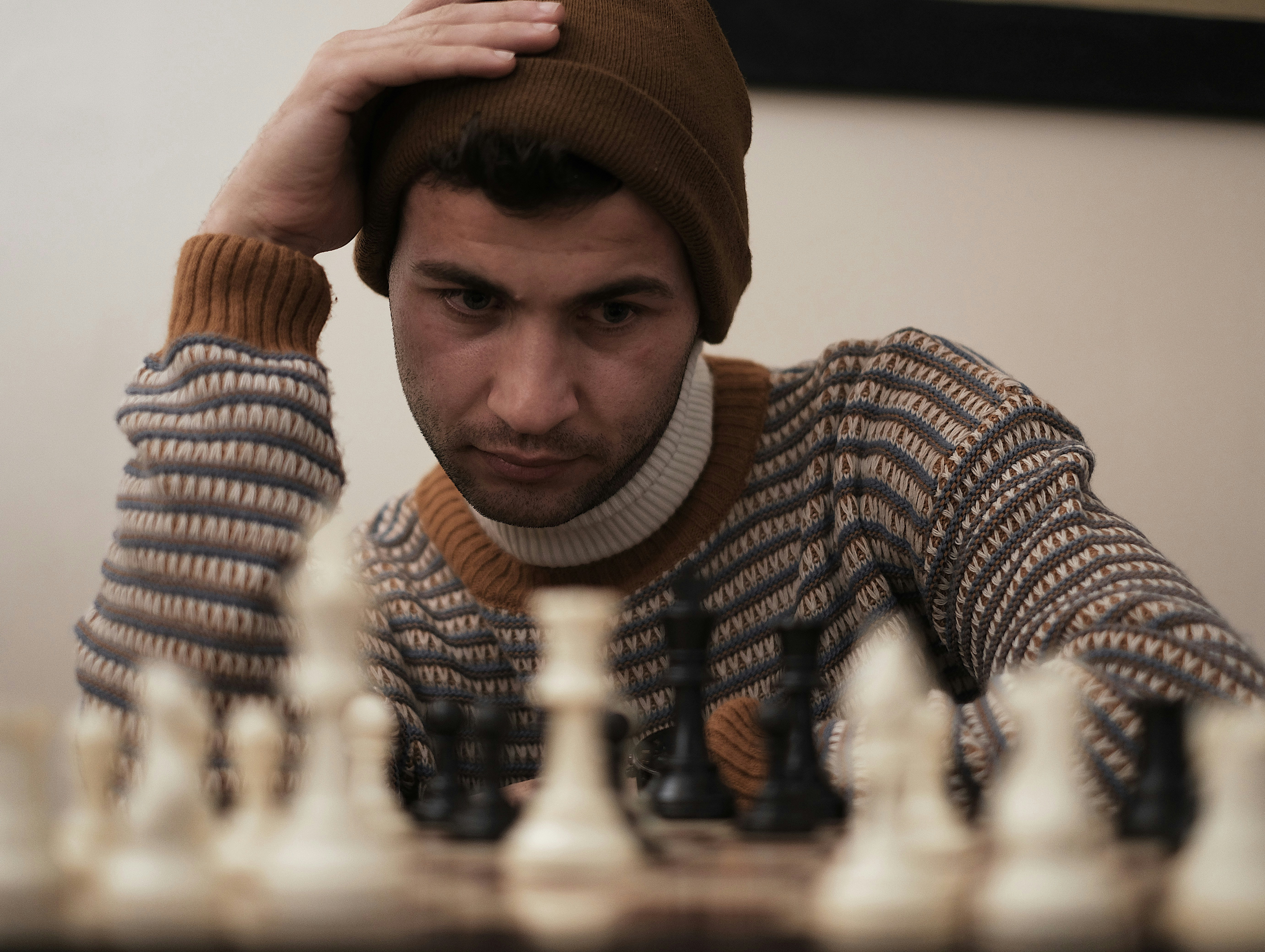 Coach analyzing chess position