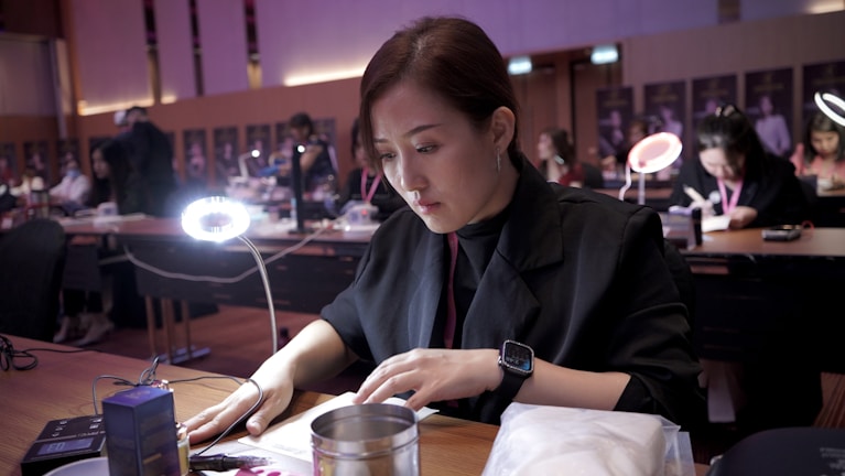 Women participating in a workshop, focused and engaged in learning together