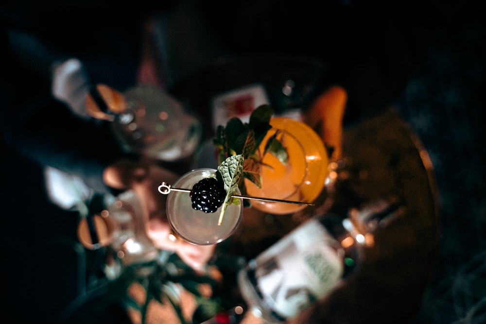 a close up of a cocktail in a glass on a table