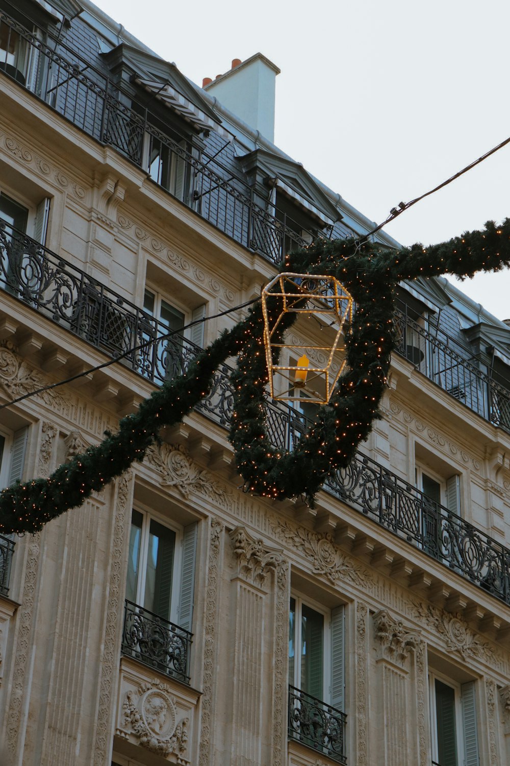 a basketball hoop is hanging from a building