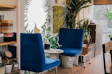 A cozy waiting area with comfortable seating and plants.