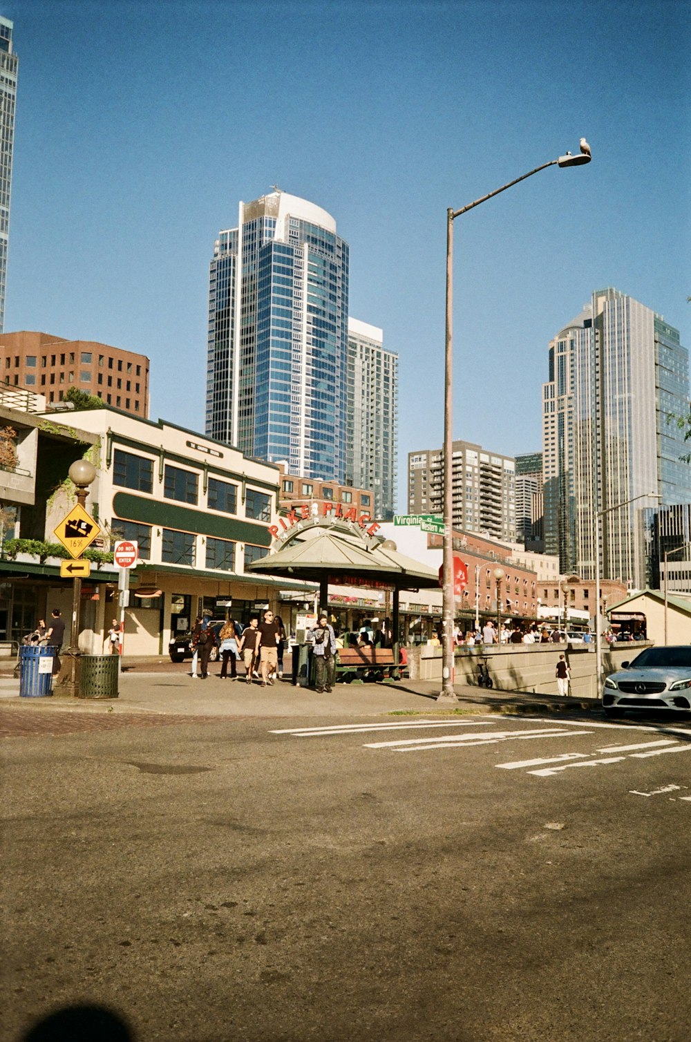 a city street with a lot of tall buildings