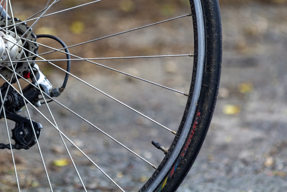 a close up of the spokes of a bicycle